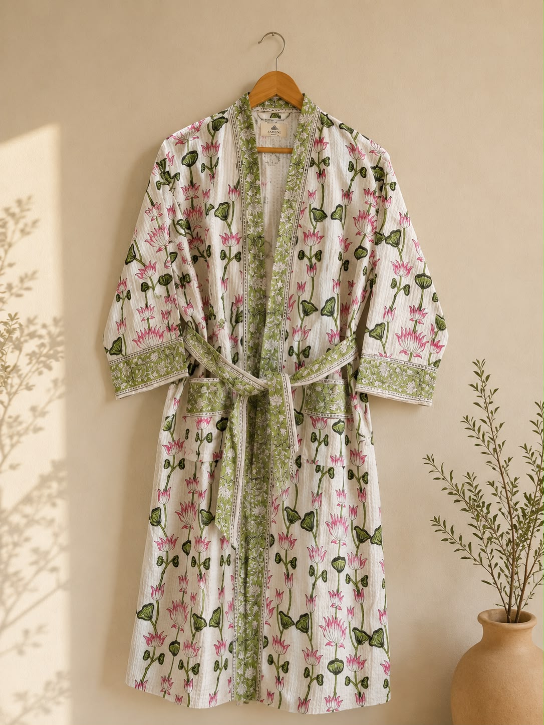 Lotus Bloom Cotton Bathrobe - flat lay on hanger