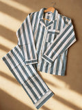 Sage Stripe Cotton PJ Set - flat lay on warm surface