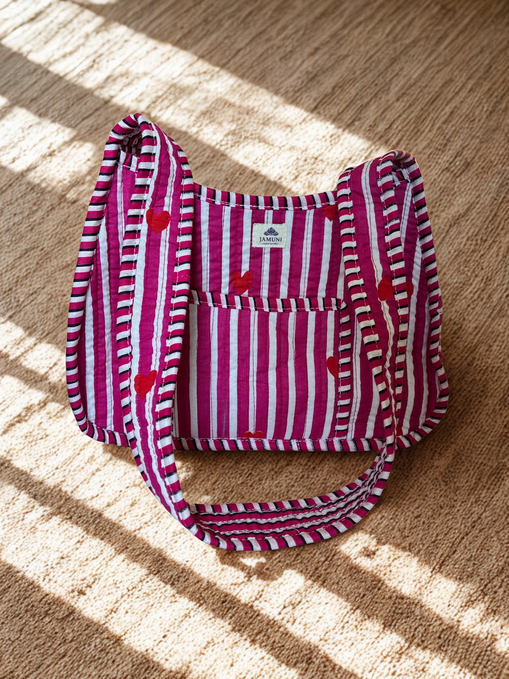 Pink Heart Quilted Cotton Shoulder Bag - flat lay top view on textured surface