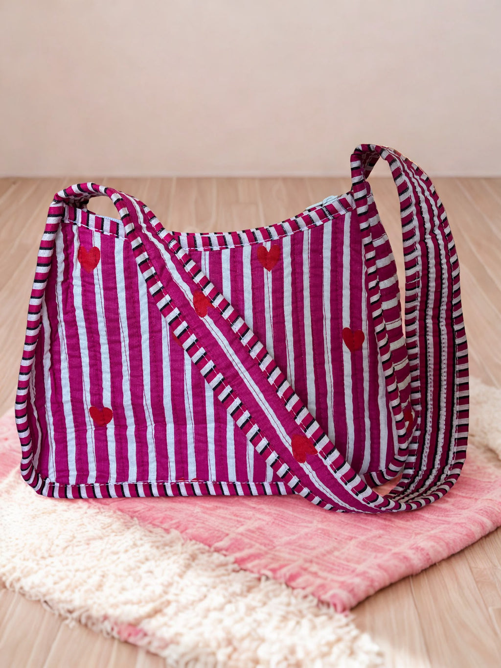 Pink Heart Quilted Cotton Shoulder Bag - styled on floor with pink rug