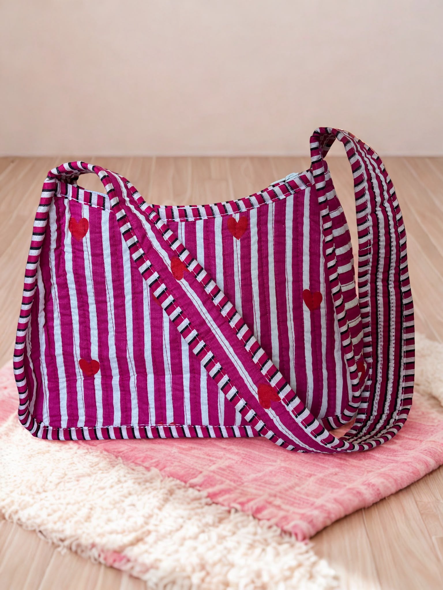 Pink Heart Quilted Cotton Shoulder Bag - styled on floor with pink rug